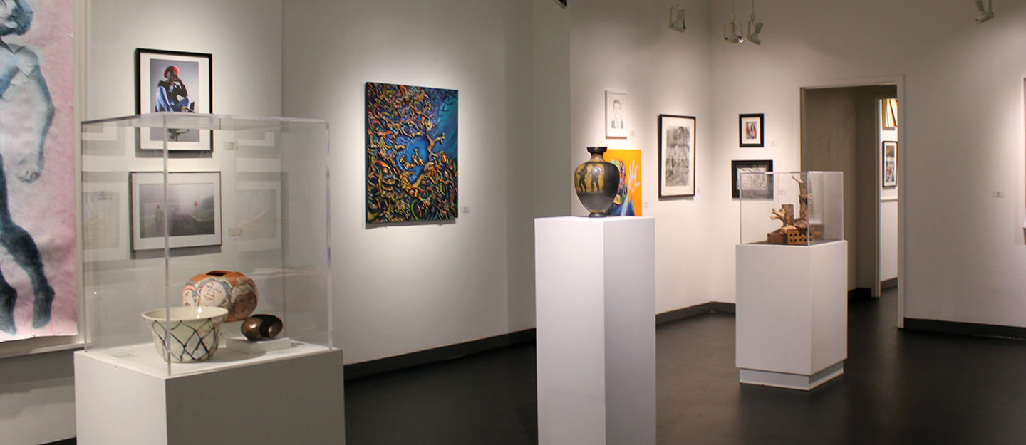 paintings and pottery displayed in Central Piedmont gallery 