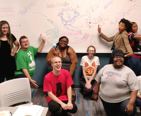 group of diverse students at poetry reading