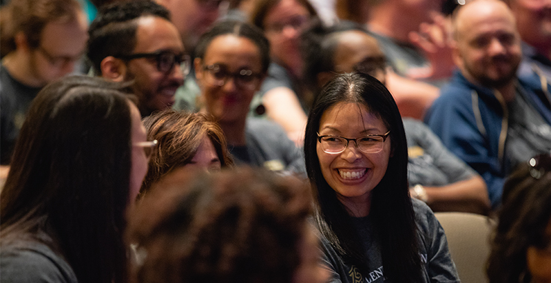 diverse central piedmont faculty and staff in the college auditorium (JPG)