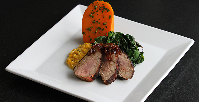 beef and vegetable dish plated at Greenway restaurant