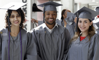 Three graduates