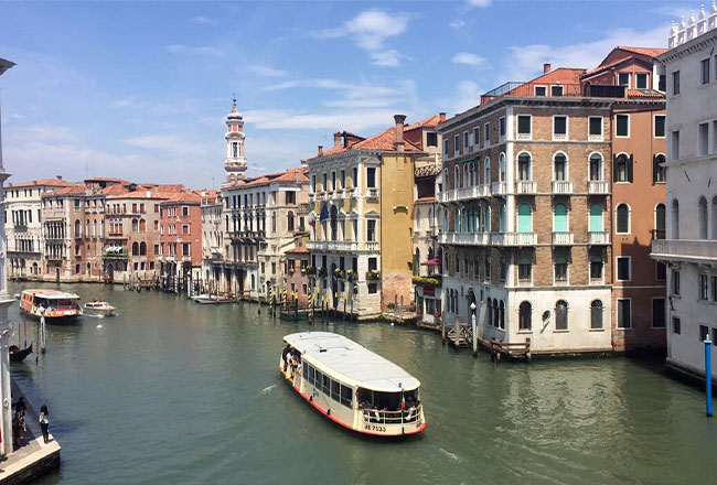 Boats on a canal in Venice, Italy