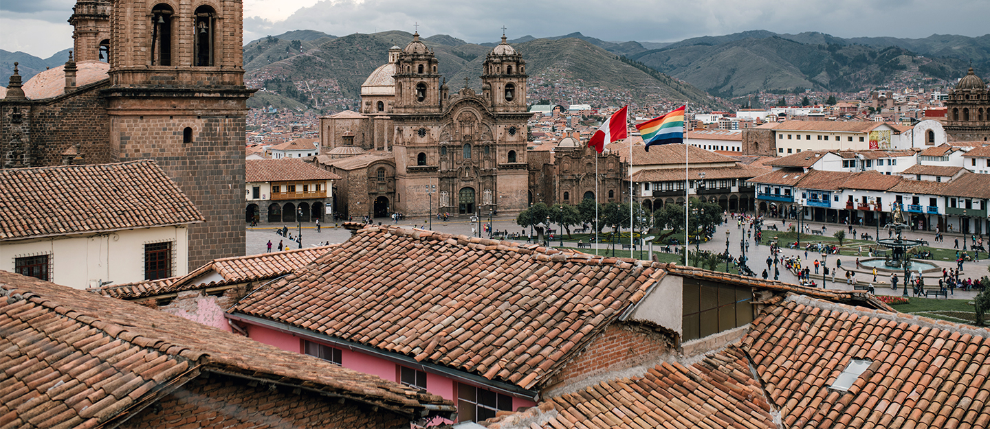 Cusco, Peru castle with mountains in the background