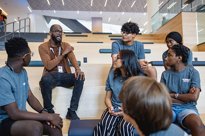 Students on the collaborative stairs in the Parr Center