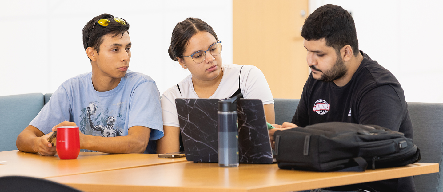 Three students in the Parr Center on the first day of classes