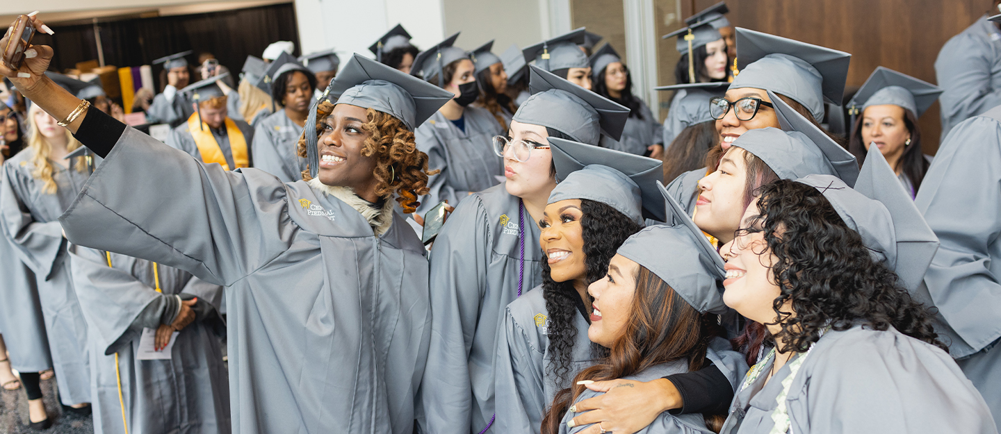 Happy graduates at Central Piedmont's December 2022 commencement