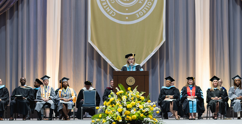 Dr. Kandi Deitemeyer addressing 2022 graduates