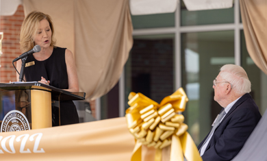 Dr. Deitemeyer speaking at the dedication of the Parr Center