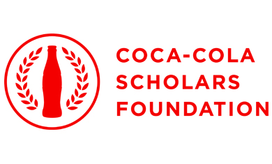All red Coca-Cola Scholars Foundation logo with a coke bottle encircled by a wreath