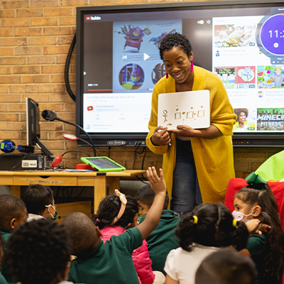 Toye Watson of PBS Charlotte, working with Pre-K students and teachers