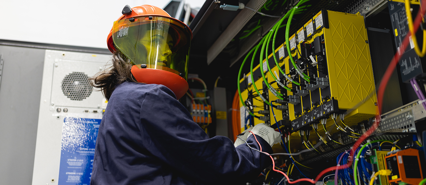 Student testing a deployment machine