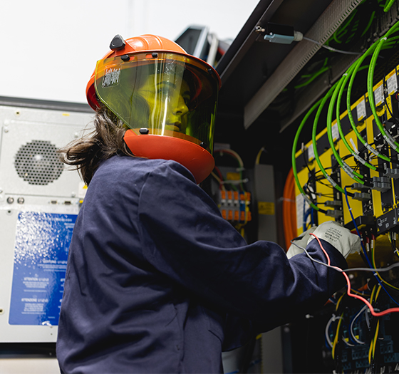 Mechtronics student testing a machine