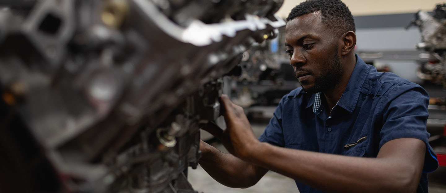 A man in an automotive class at Central Piedmont