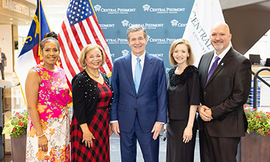 Commerce Sec. Machelle Baker Sanders, Charlotte Mayor Vi Lyles, Gov. Roy Cooper, Central Piedmont President Dr. Deitemeyer, NCCCS President Dr. Jeff Cox