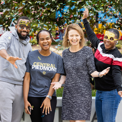 Students and Dr. D celebrating 60th Anniversary of the college