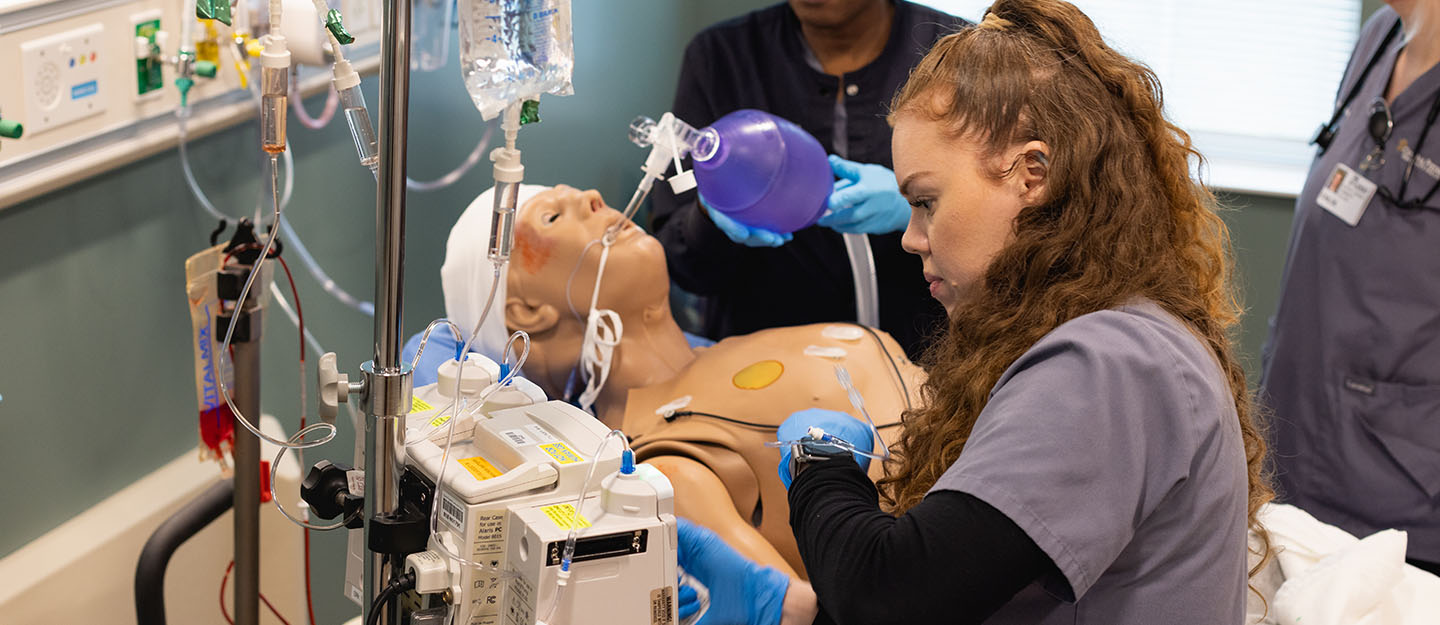 Central Piedmont nursing students in a campus lab