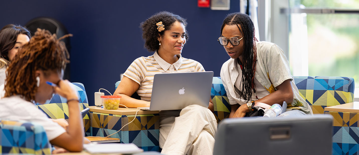 diverse students on laptops in a classroom at Levine Campus of Central Piedmont Community College 