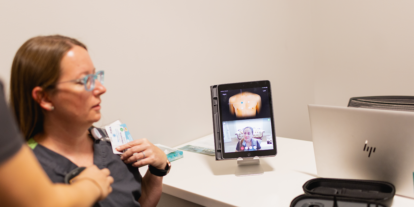 Virtual clinic nurses speaking with client 