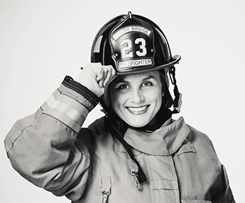 Rachael Helms in a firefighter uniform