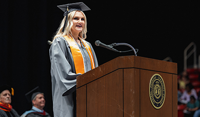 Brianna Duncan speaking at graduation