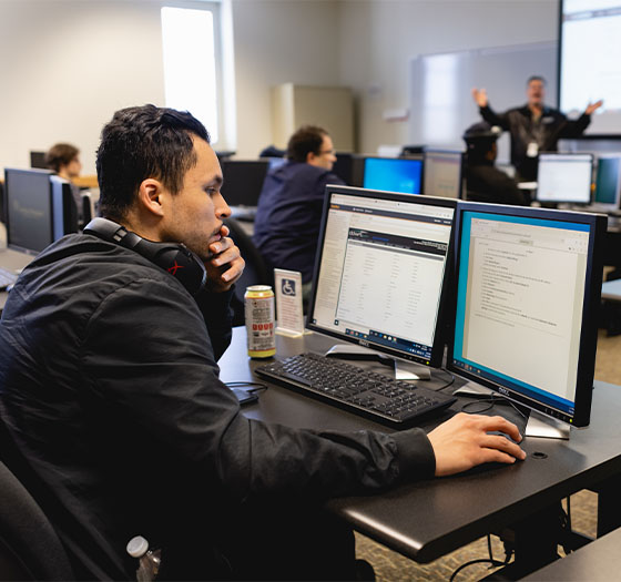 Central Piedmont student in a computer lab