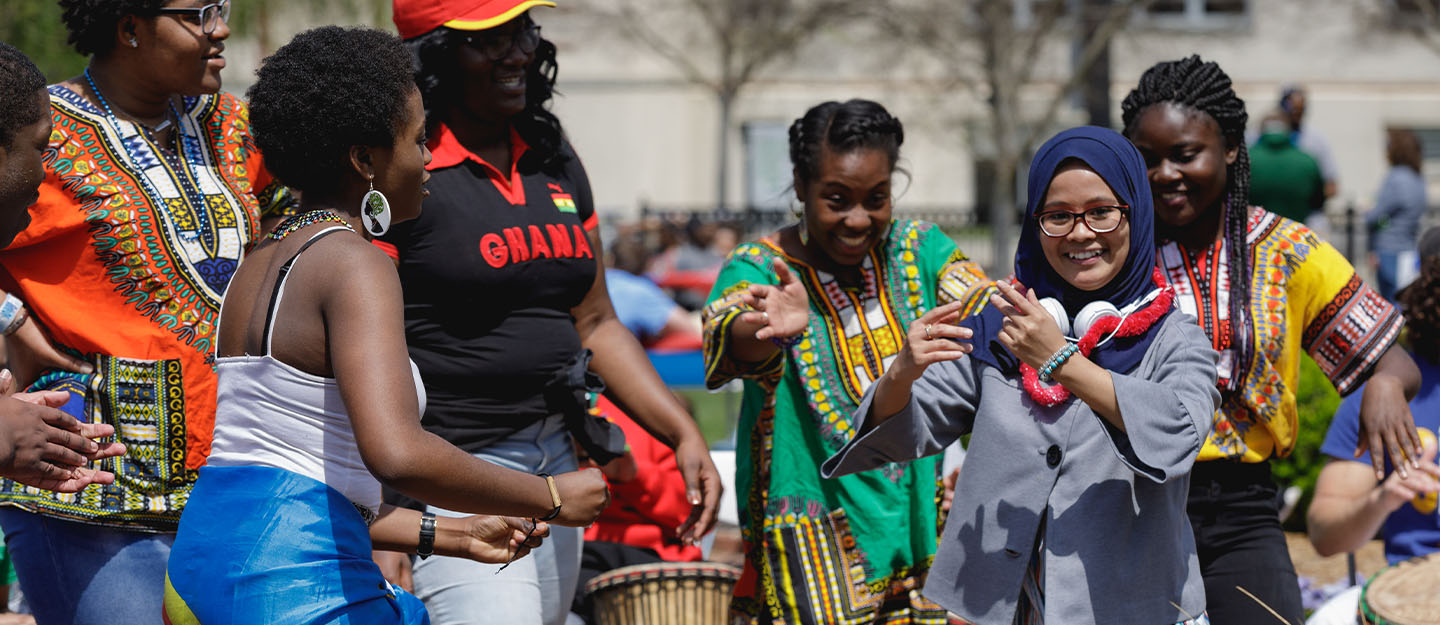 International students dancing and playing music at Central Piedmont