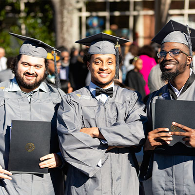 Three Central Piedmont students at graduation