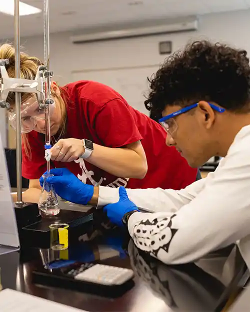 students working on a science experiment in a lab on Central Campus at Central Piedmont Community College