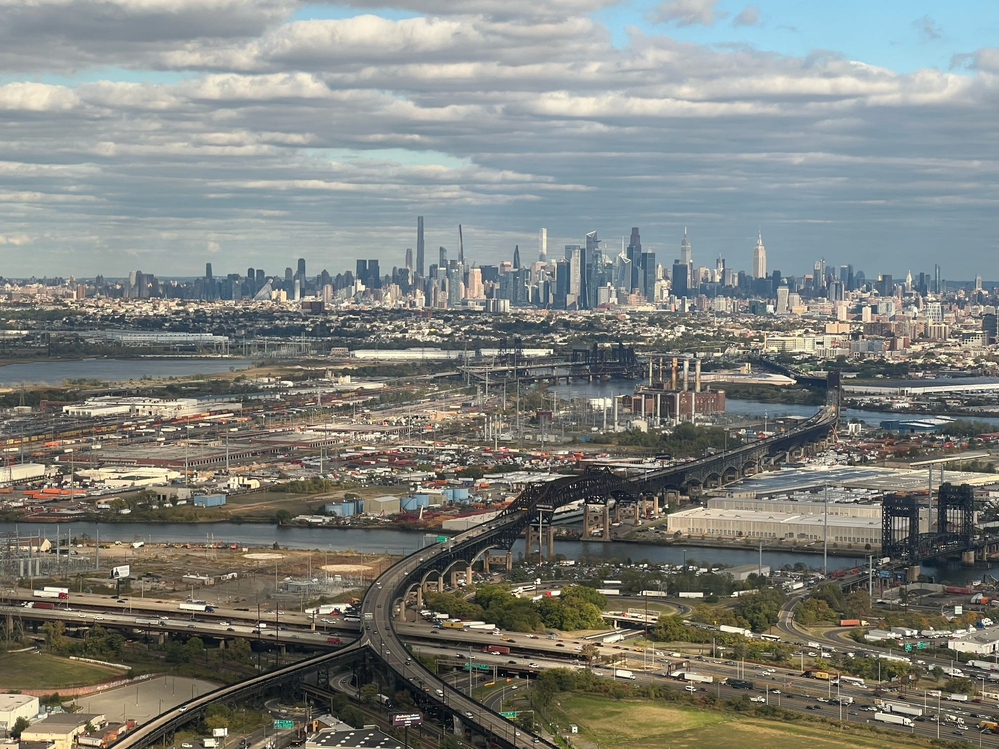 Aerial view of a city skyline and interstate interchange