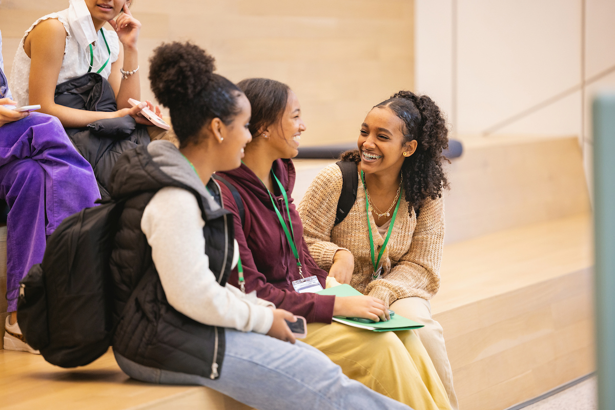 Three students sitting together