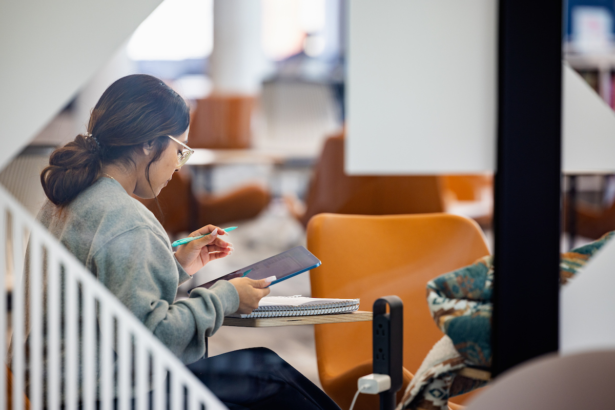 Student studying in the library.