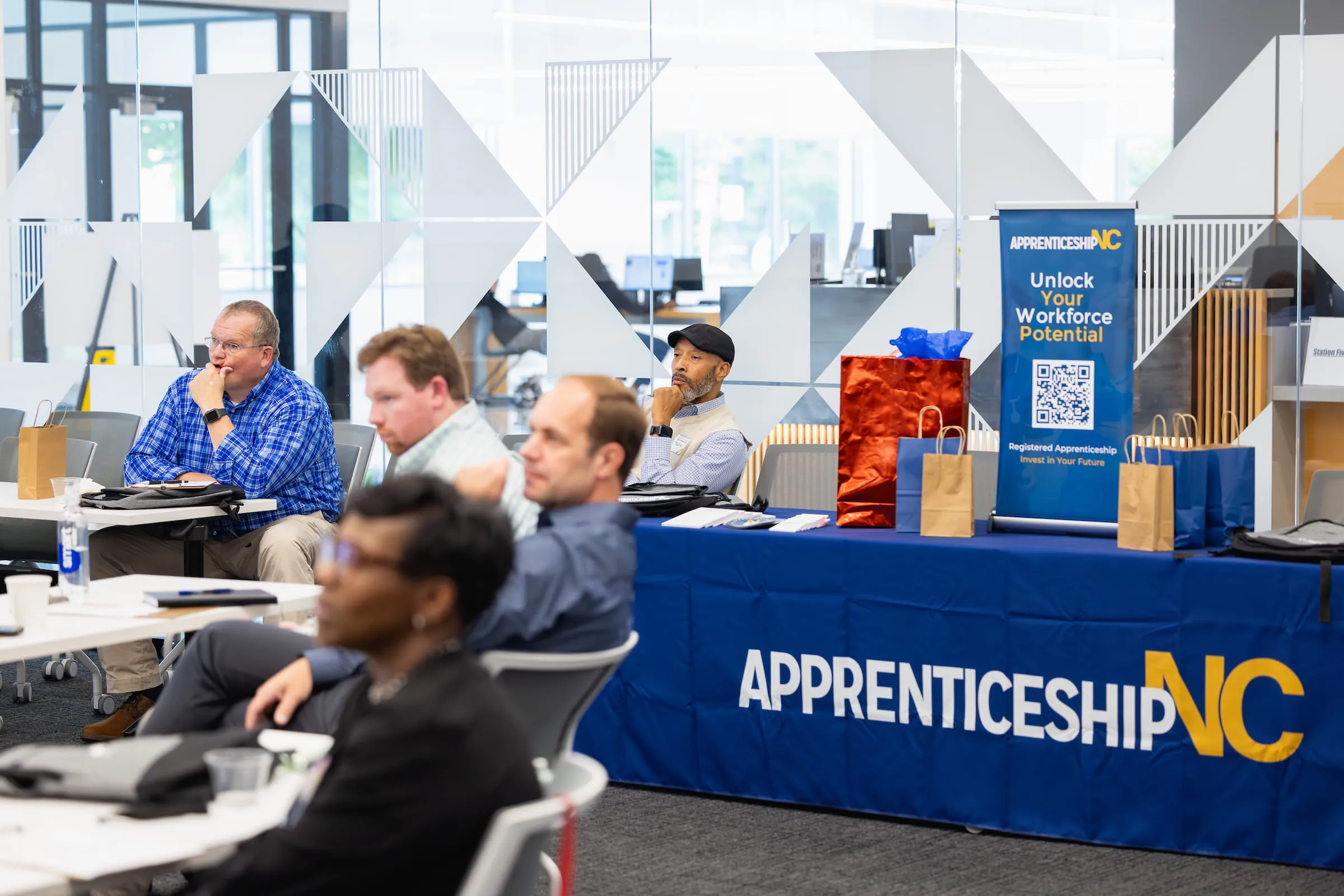 Participants seated at an ApprenticeshipNC information session