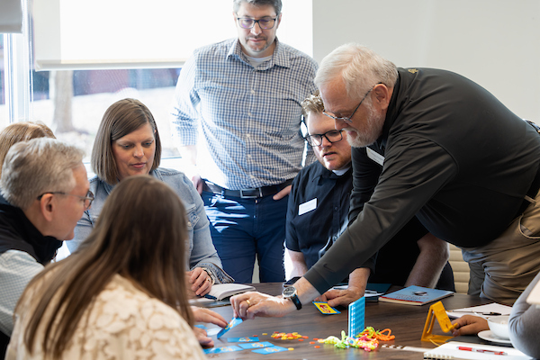 Group working together on a hands-on team building activity