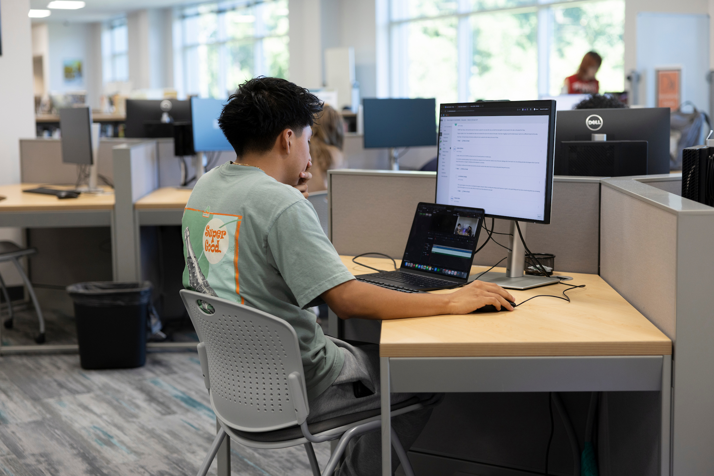 A Central Piedmont student in the library