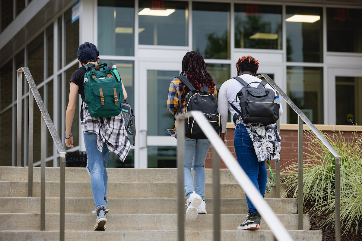 Central Piedmont students walking up an outdoor staircase