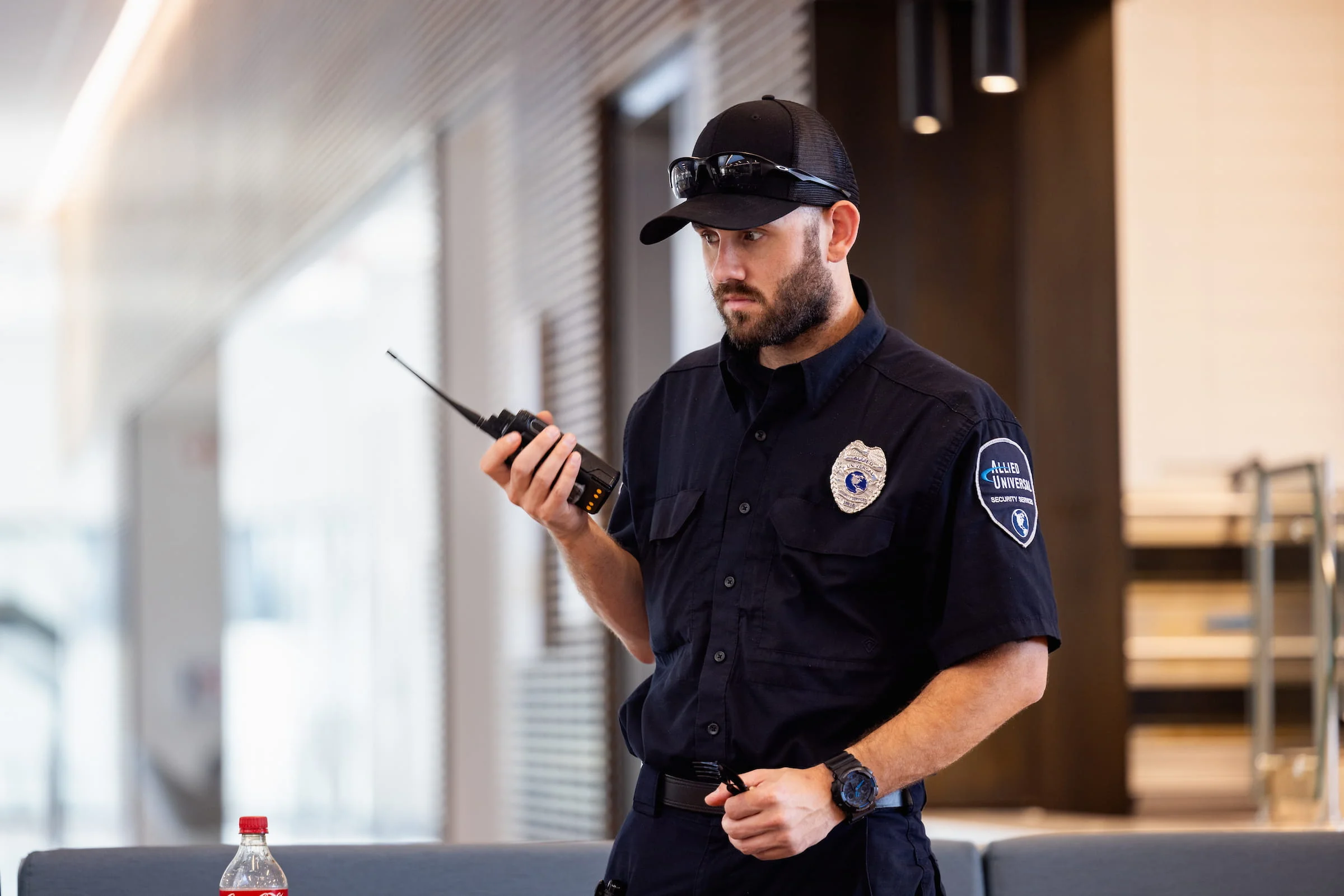 Campus security officer speaking into a radio