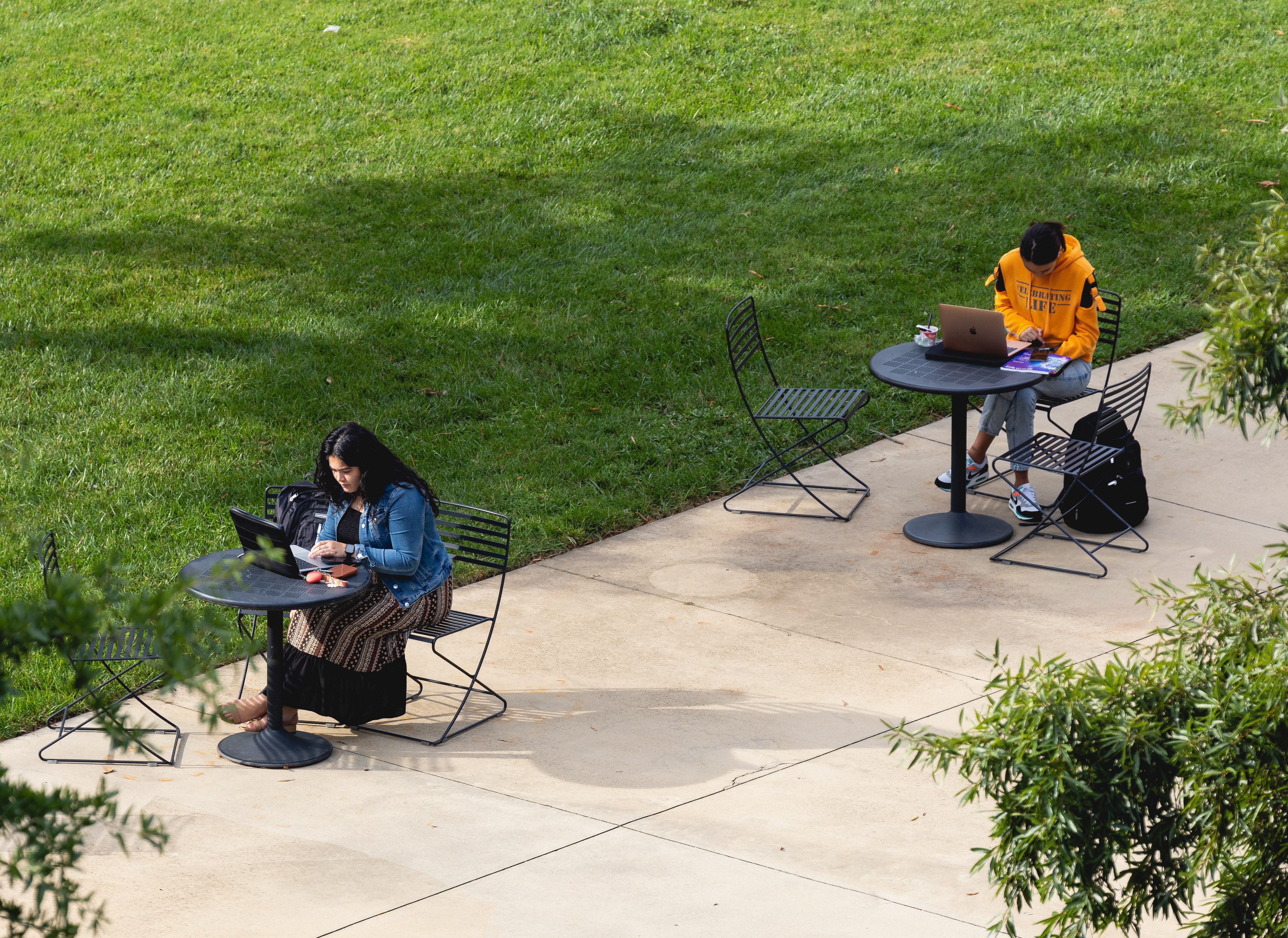 Aerial view of students studying at outdoor tables