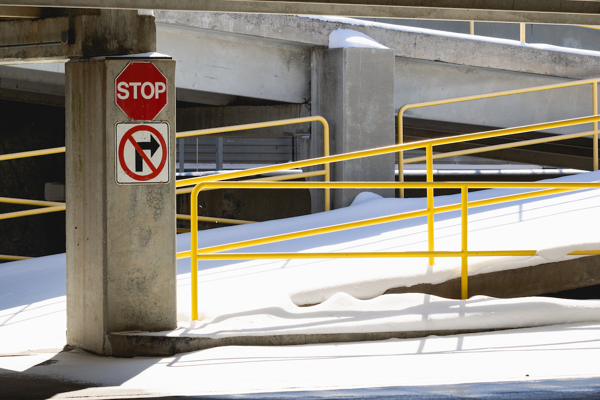 Stop sign inside of a parking garage