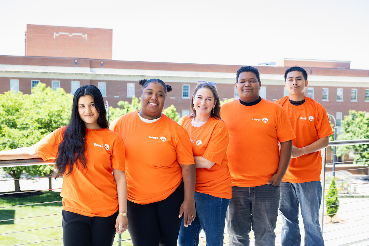 Five NC Boost students standing outside together