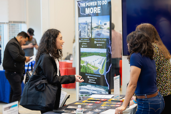 Central Piedmont student attending meeting with employers at a recruitment event