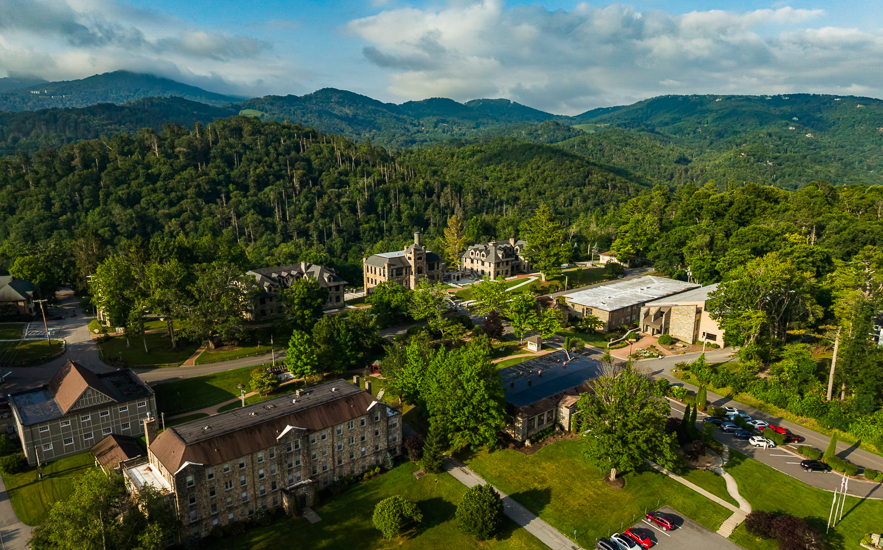Aerial view of the Lees-McRae College campus among wooded mountains
