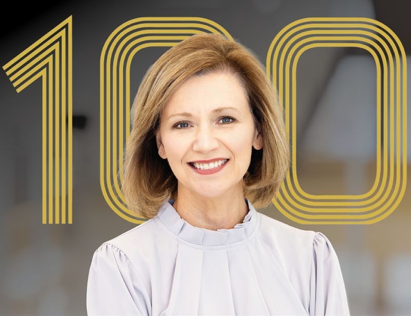 Image of Dr. Deitemeyer with "100" in gold behind her