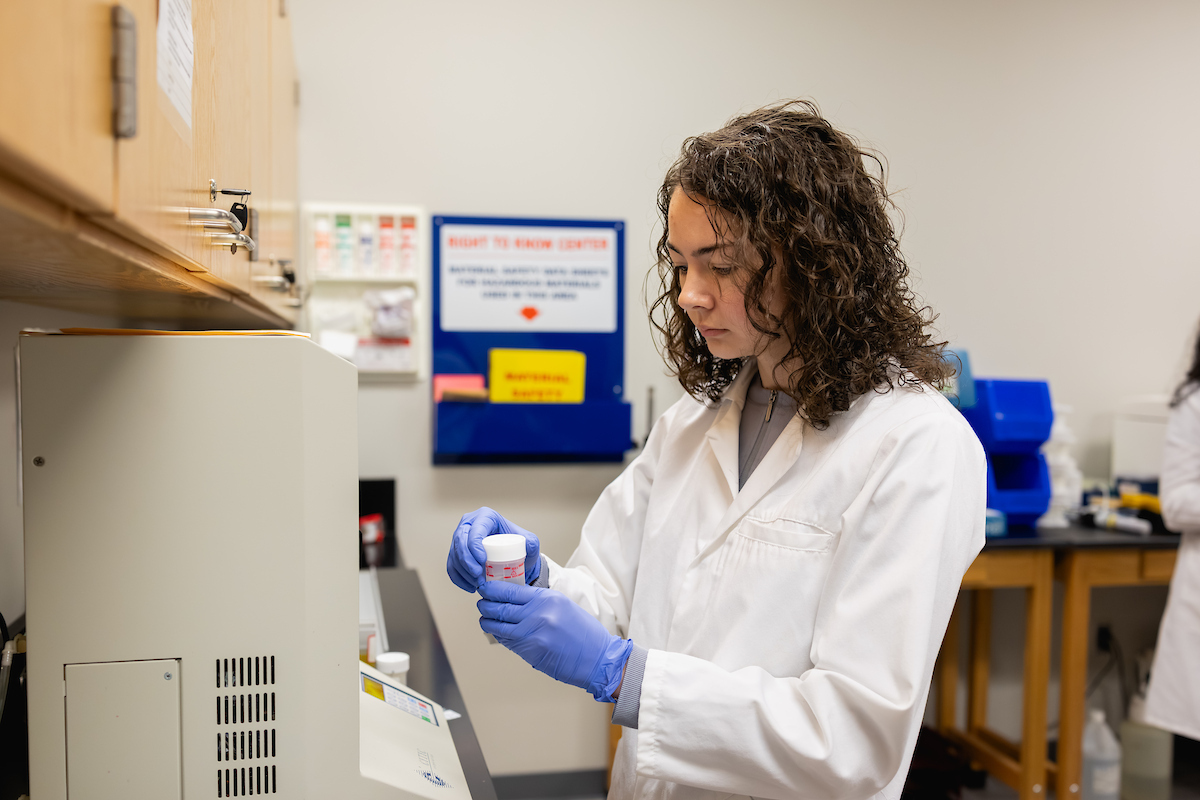 Cytotechnology student practicing new skills in a laboratory setting.
