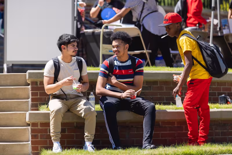 Students gathering outdoors at Cato campus