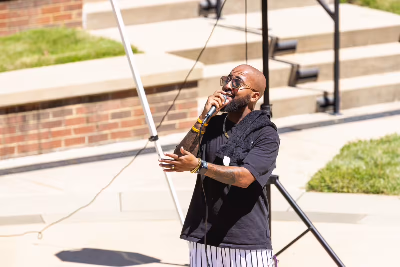 Student singing into microphone