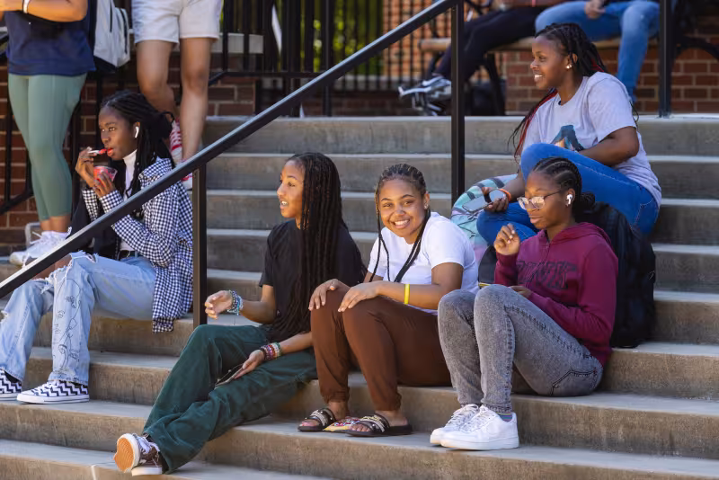 Students gathering on stairs