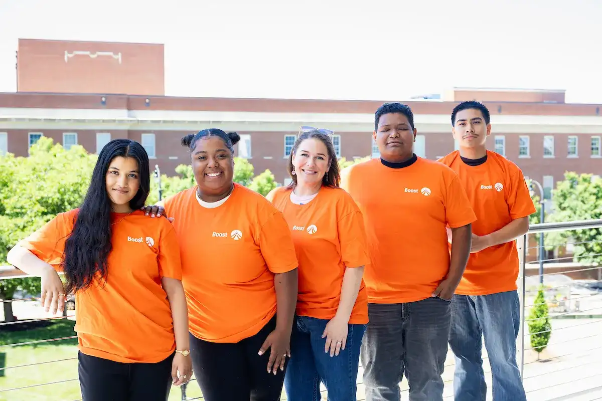 NC Boost students standing together on the balcony of the Parr Center