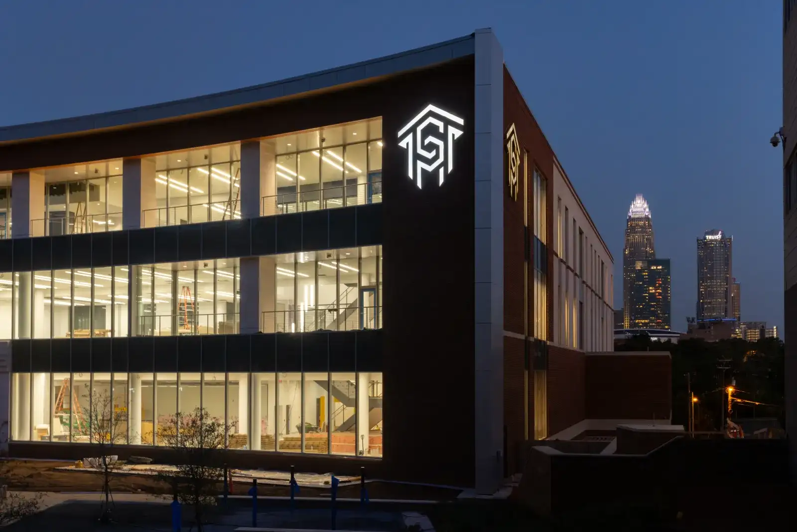 Parr building at night with interior lights on