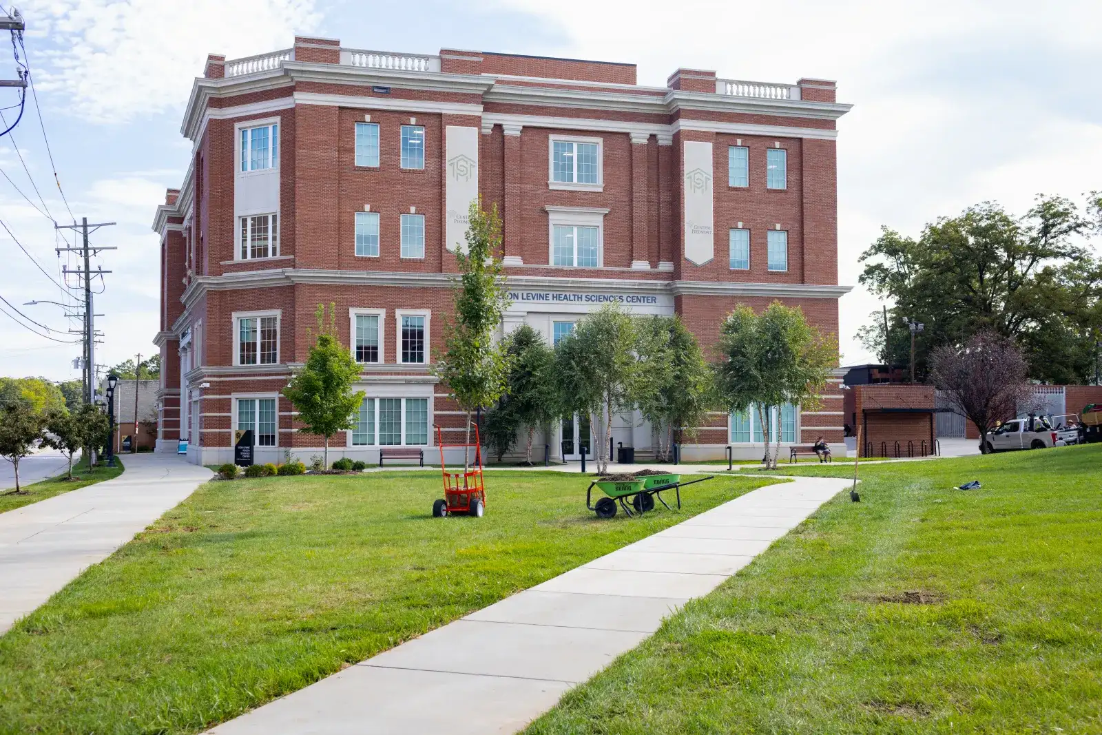Outdoor image of the front of the Levine Health Sciences Center on Central campus