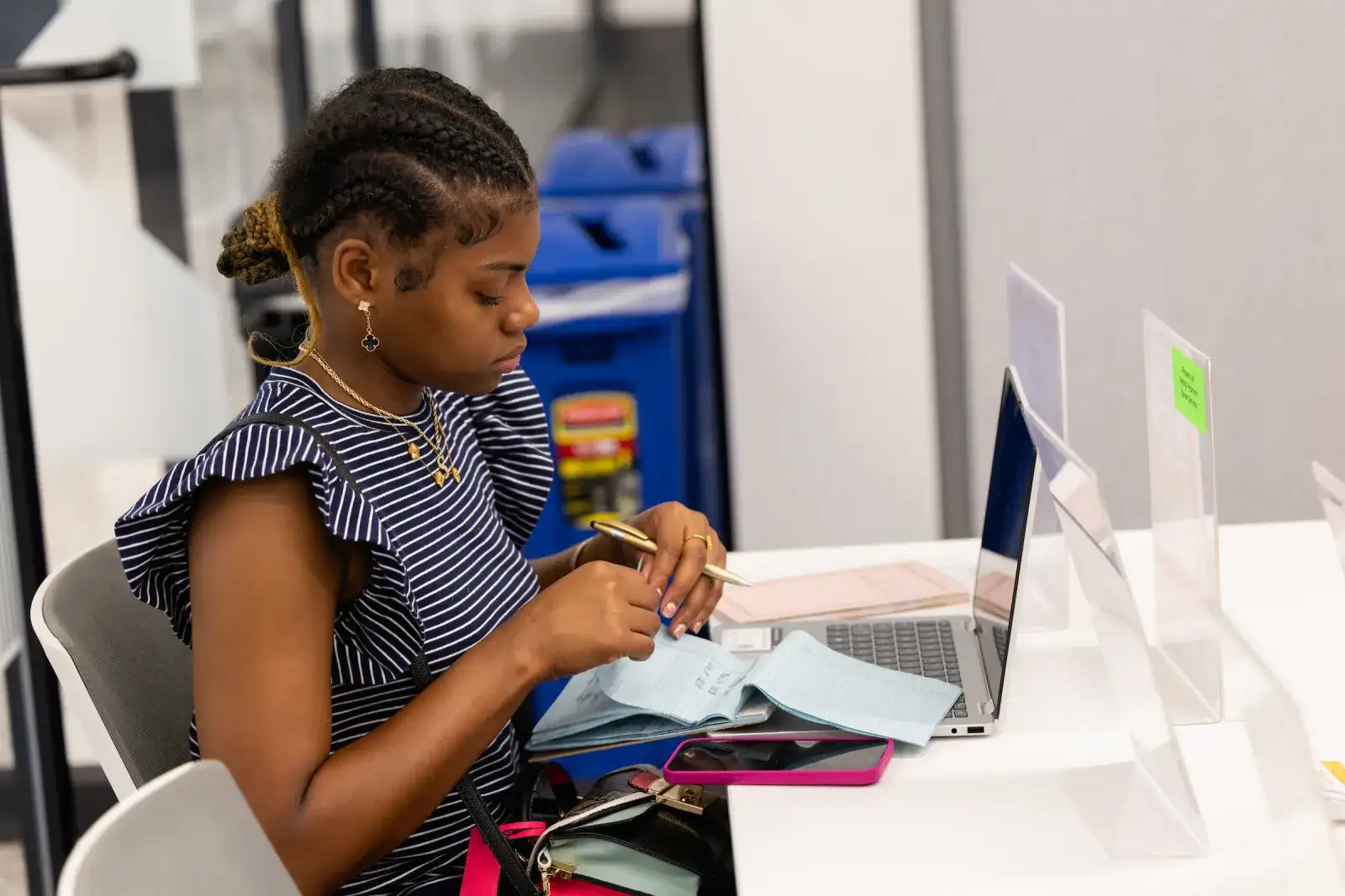A Central Piedmont student working on a laptop